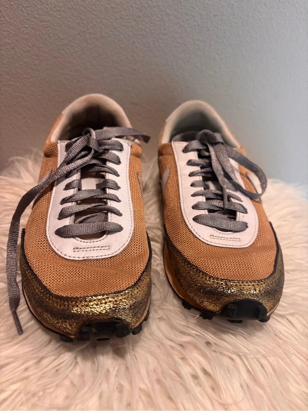 Nike Women’s Metallic Gold Mesh Sneakers